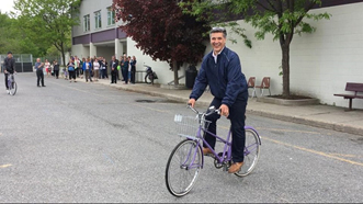 Louis Antonakos participating in the Mayor's Slow Bike Race